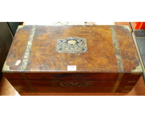 A large 19th century walnut and brass bound box plus contents to include; mantel clock, binoculars, brass Art Nouveau easel p