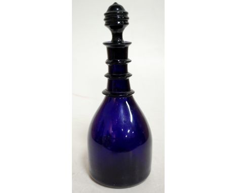 A 19th century Bristol blue glass triple ring neck mallet decanter and stopper