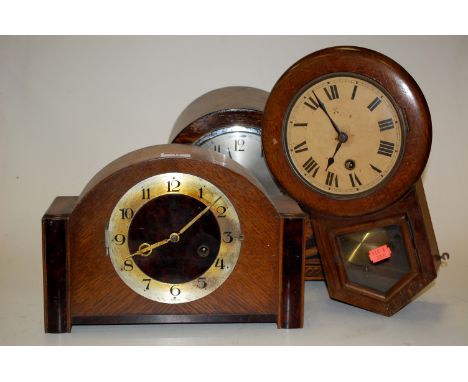 An oak cased dome top mantel clock, one other, and a beechwood drop trunk small wall clock (3)