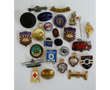 A quantity of enamel brooches etc
