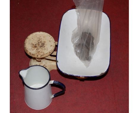 A set of early 20th century kitchen scales and weights, together with an enamel jug 