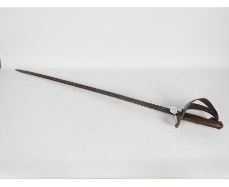 An Italian model 1871/1909 cavalry trooper's sword with 91 cm pipe back blade.