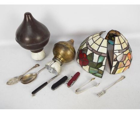 Two vintage flag pole finials of onion form, a pair of Tiffany style wall light shades, penknives and similar.