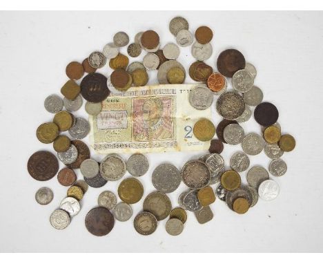 A quantity of Commonwealth and foreign coins and banknote.