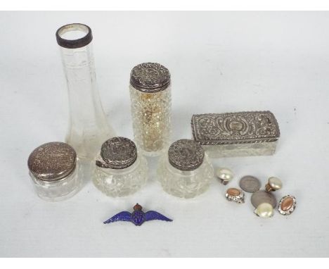 A collection of cut glass, silver lidded dressing table jars, vase with silver collar and an enamel RAF Sweetheart brooch.