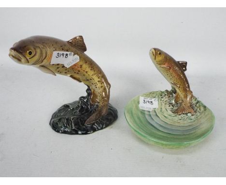 A Beswick study of a Trout, impressed 1032 to the base, approximately 15.5 cm (h) and a similar Beswick dish. [2]Condition Re