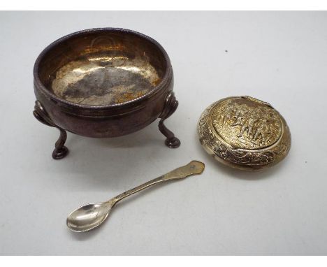 A Georgian silver salt, London assay 1783, raised on tripod hoof supports with a later silver spoon and white metal snuff box