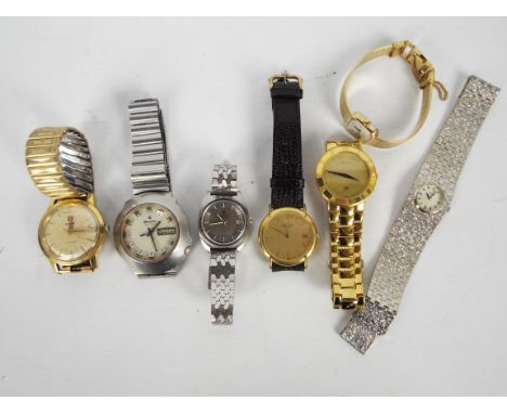 A collection of wristwatches to include Gucci, Bulova, Raymond Weil, Rado and similar.Condition Report: The Gucci and Rado wa