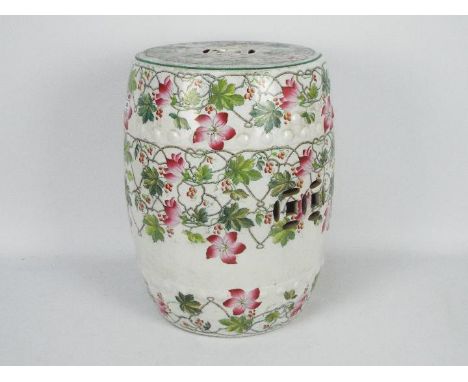 A Copeland Late Spode ceramic garden seat of barrel or drum form, in the Chinese style, decorated with flowers, approximately