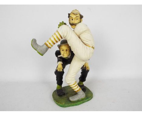Figurine depicting a baseball pitcher, approximately 36 cm (h).