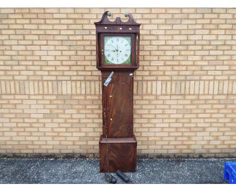 A good early 19th century mahogany 8-day longcase clock, square painted dial with unusual green background to the gilded span