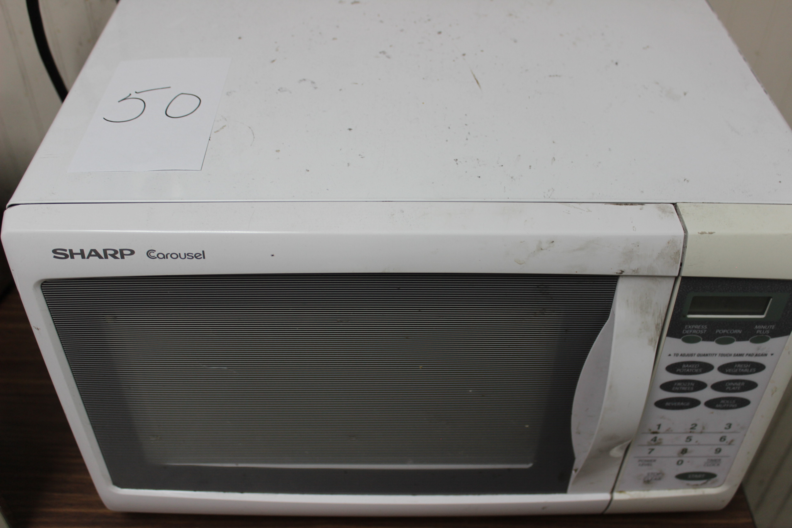Sharp Carousel Microwave Model R-209FW S/N 370871 - Located In Bristol, TN