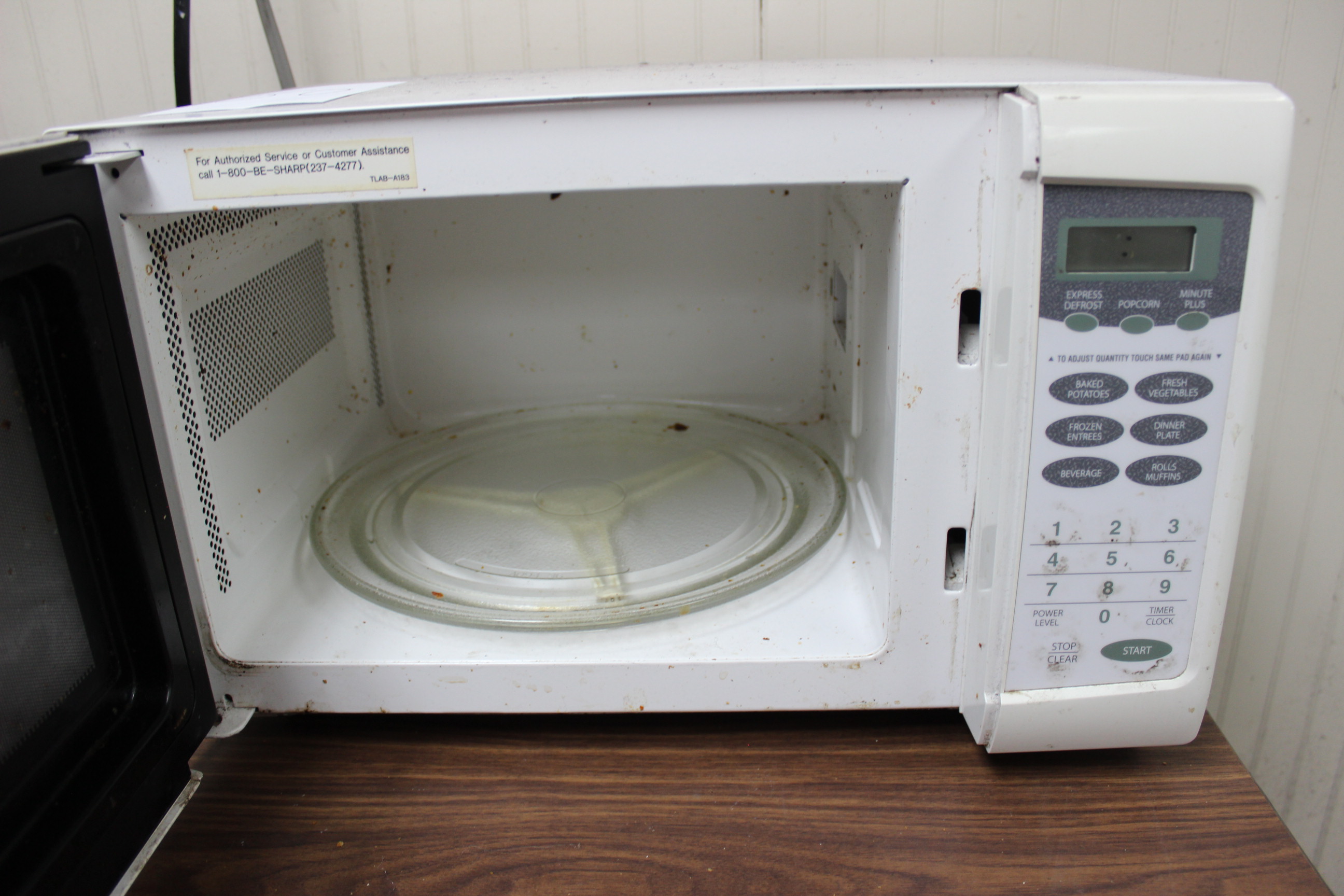 Sharp Carousel Microwave Model R209FW S/N 370871 Located In Bristol, TN