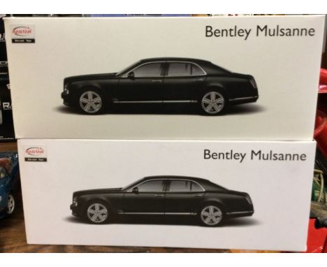 Two boxed 1:18 scale model Bentleys. Est. £20 - £30.