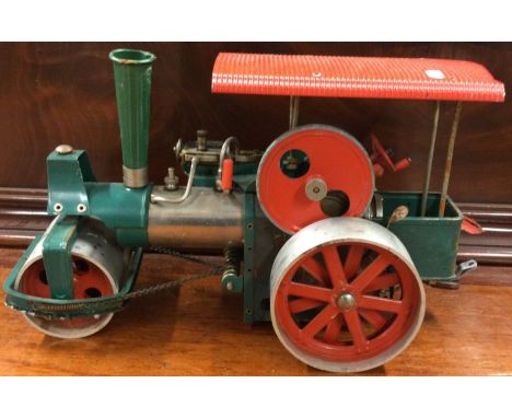 An old Smoky steam engine. Est. £20 - £30.