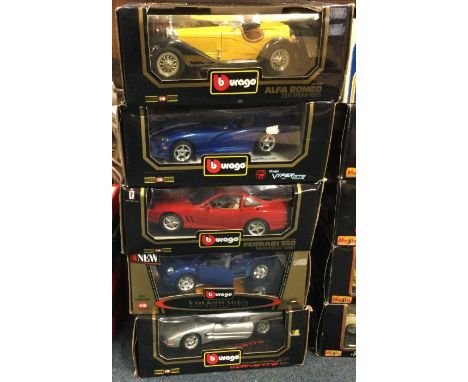 Five various 1:18 scale boxed model cars. Est. £20 - £30.