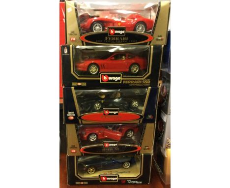 Five various 1:18 scale boxed model cars. Est. £20 - £30.