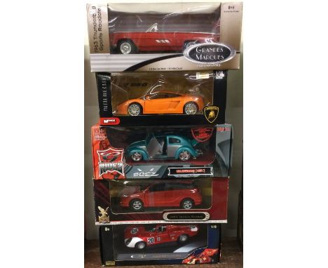 Five various 1:18 scale boxed model cars. Est. £20 - £30.