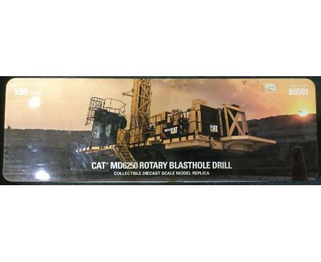 CAT: A boxed rotary blasthole drill. Est. £20 - £30.