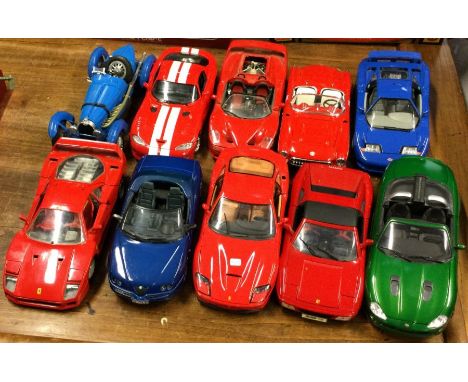 Ten various unboxed 1:18 scale model cars. Est. £20 - £30.