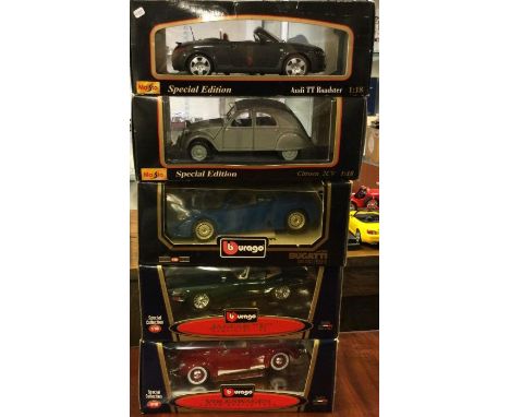 Five various 1:18 scale boxed model cars. Est. £20 - £30.