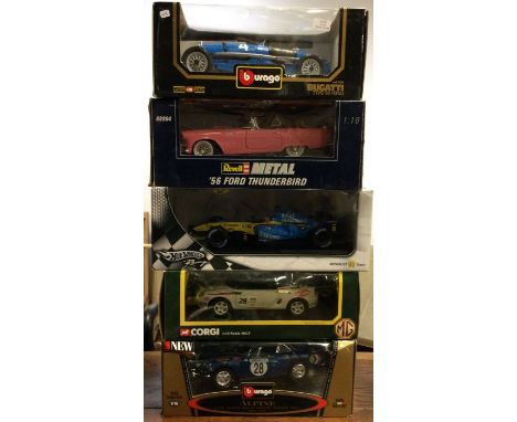 Five various 1:18 scale boxed model cars. Est. £20 - £30.