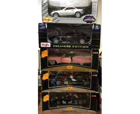 MAISTO: Five various 1:18 scale boxed model cars. Est. £20 - £30.