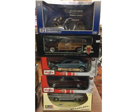 Five various 1:18 scale boxed model cars. Est. £20 - £30.