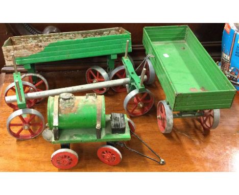 A selection of old steam engine trailers. Est. £20 - £30.