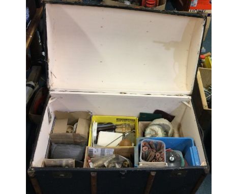 A trunk containing sand paper and buffers etc. Est. £20 - £30.