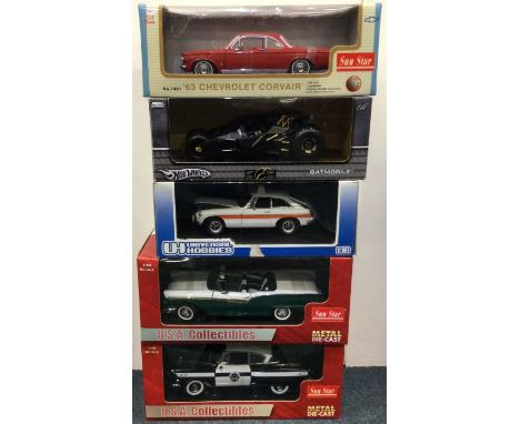 Five various 1:18 scale boxed model cars. Est. £20 - £30.