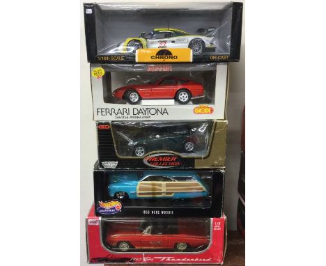 Five various 1:18 scale boxed model cars. Est. £20 - £30.