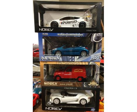 NOREV: Four various 1:18 scale boxed model cars. Est. £20 - £30.