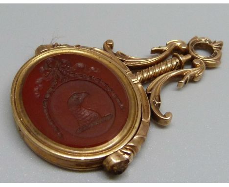 A yellow metal mounted swivel fob, the portrait side marked W. Brown 