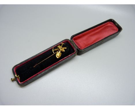 A yellow metal mining stick pin, 2.5g, (tests as high carat gold) 