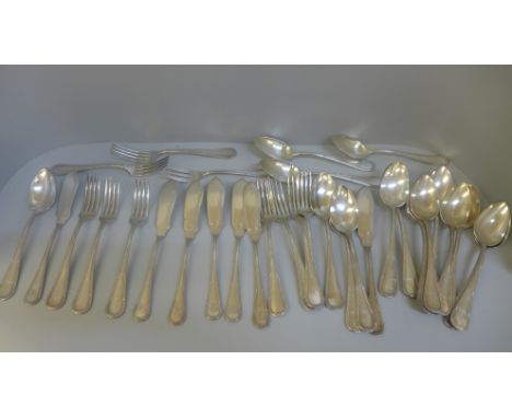 A collection of Russian silver cutlery, marked 84, nine forks, eighteen spoons, seven servers/spreaders and one other fork, 2