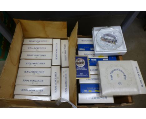Two boxes of Royal Worcester Christmas plates 