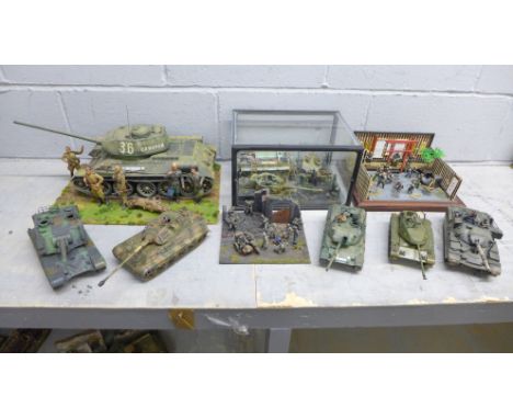 Three plastic model dioramas of WWII soldiers, (one cased plus one of Japanese Samurai) and five military vehicles 