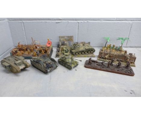 Five WWI and WWII model dioramas and three military vehicles 