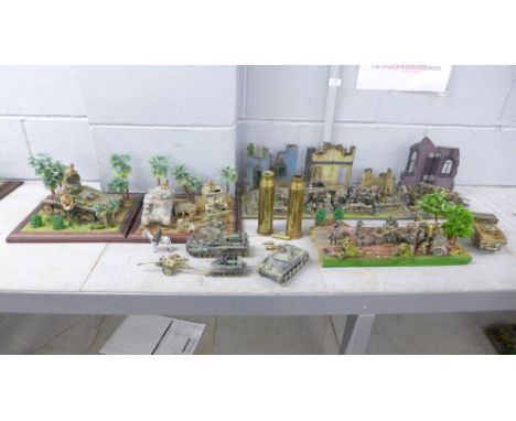 Four plastic model dioramas of WWII soldiers, five military vehicles, two brass shell cases and three bullets 
