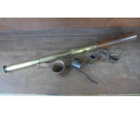 A Negretti &amp; Zambia 1915 brass telescope, leather cased and additional lens 
