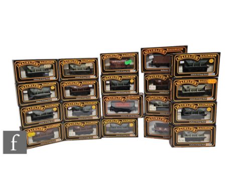A collection of OO gauge Mainline rolling stock, almost all hopper wagons, boxed. (20) 