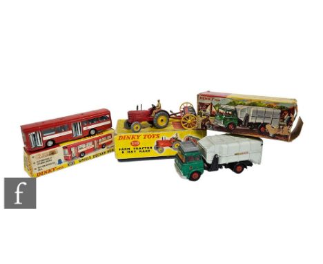 Three Dinky diecast models, 310 Farm Tractor and Hay Rake, 978 Refuse Wagon, and 283 Single Decker Bus. (3) 