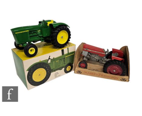 Two ERTL diecast model tractors, MF175 1:16 scale Massey-Ferguson 175 in red, and 555 John Deere Toy Tractor, both boxed. (2)