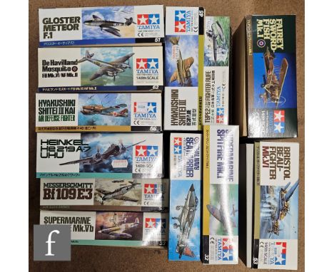 Twelve Tamiya 1:48 scale plastic model kids, all military aircraft, to include 61053-2800 Bristol Beaufighter MkVI, 61068 Fai