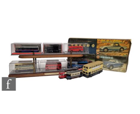 A collection of assorted diecast models, to include boxed Corgi Original Omnibus Company, unboxed Corgi trams with a display 