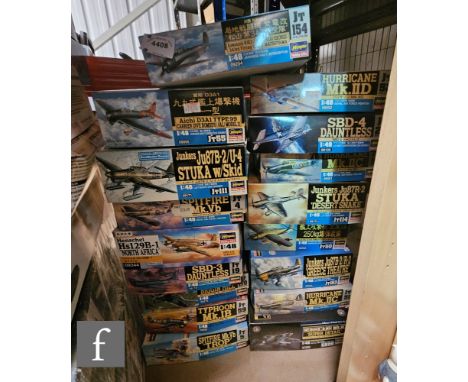 Seventeen Hasegawa 1:48 scale plastic model kits, all military aircraft, to include 09120 SBD-4 Dauntless, 09052 Hurricane Mk