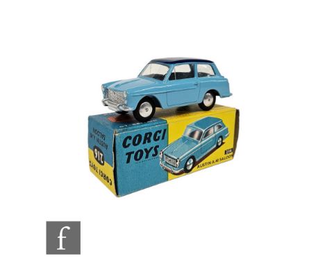 A Corgi 216 Austin A40 Saloon in light blue with dark blue roof, silver trim and flat spun hubs in blue and yellow picture bo