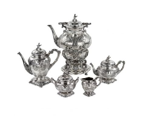 Complete tea and coffee service in 84 sterling silver. Comprising: teapot, coffee pot, sugar bowl, milk jug and bouillotte, w