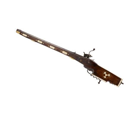  Splendid bone-decorated gun with wheellock and arquebus-type stock, long brass trigger guard, late 17th century. A shortened